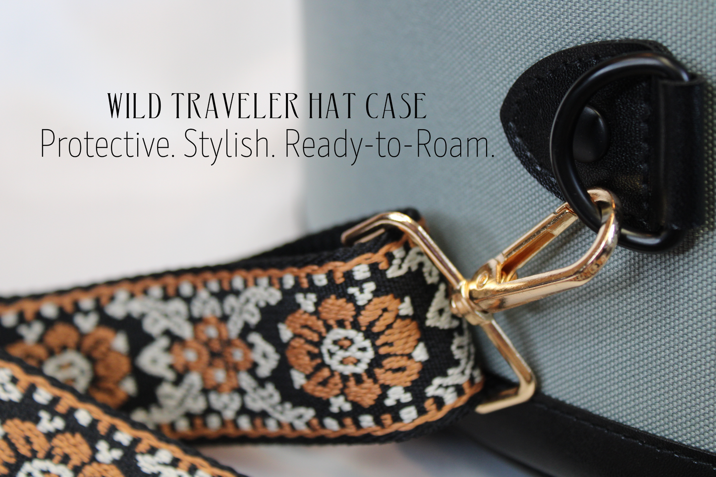 Decorative hat case strap with text 'Wild Traveler Hat Case' on a neutral background