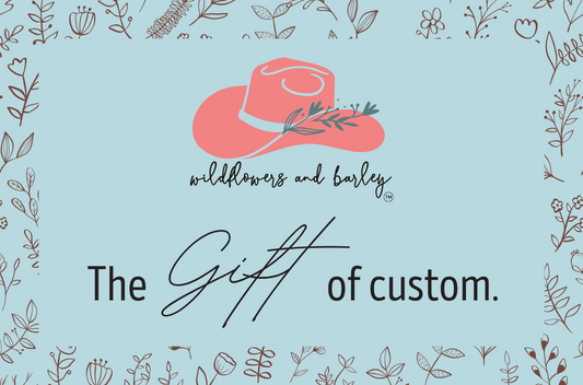 Promotional graphic with a pink hat, text 'wildflowers and barley', and decorative elements on a light blue background.